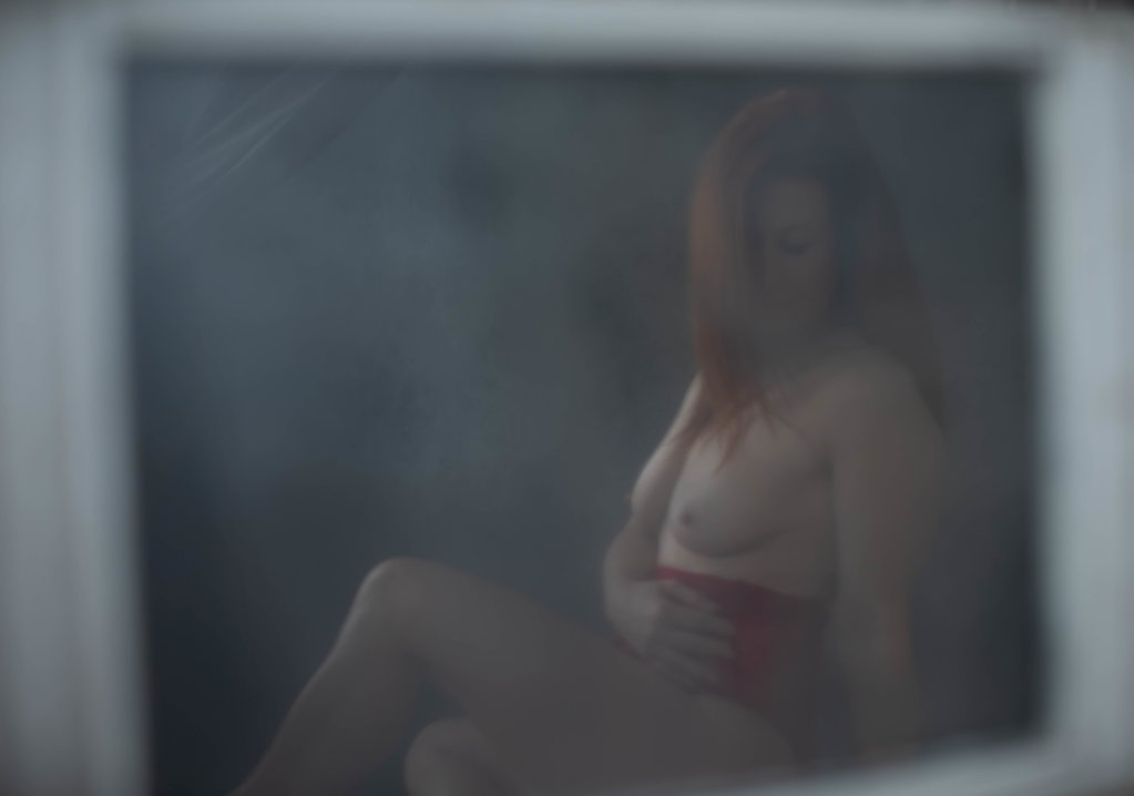 Nu au miroir